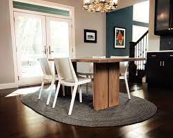 Round dining tables look great with round or square rugs. Dombre 6 X 9 Oval Area Rug Rug Dining Room Dining Room Rug Home Decor