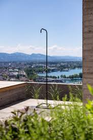 Light bulb above the shower or bathtub went out? Tarantik Egger Creates Freestanding Minimalist Outdoor Shower