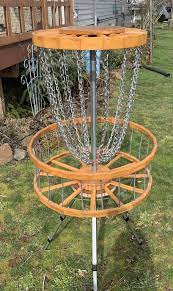 This basket from dynamic discs is my favorite for bringing around to different places. Pin On Disc Golf Basket