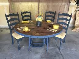 Rustic Dining Room With Vintage Singer Sewing Machine Base Yellow Chevron Chairs And Wooden Cheap Dining Room Chairs Rustic Dining Room Sewing Machine Tables