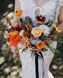 Burnt orange flowers wedding bouquet. Organic Fall Wedding Bouquet With Gold Burnt Orange Burgundy And Blue Westshore Cafe Wedd Orange Wedding Flowers Fall Wedding Flowers Fall Wedding Bouquets