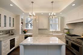 A Tray Ceiling Is A Ceiling That Steps Up In The Middle To A Higher Ceiling Height If White Modern Kitchen Calacatta Marble Kitchen White Kitchen Backsplash