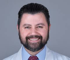 John G. Devlin, M.D.