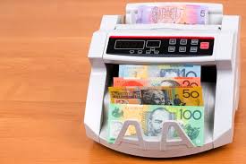 Australian Dollars In A Counting Machine Photo Premium
