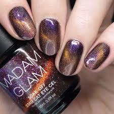 Black And Orange Cat Eye Nails Madam Glam Cat Eye Gel Polish More Cat Eye Gel Polish Cat Eye Nails Nail Polish