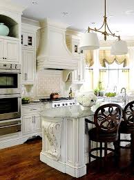 The curtain covered cabinet is 100 percent farmhouse. Get The Look French Country Kitchen 9 Photos Country Kitchen Designs Modern French Country Kitchen French Country Kitchens