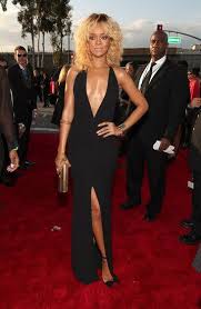 Rihanna Shows Skin In A Backless Black Armani Gown At The Grammys Armani Gowns Armani Dress Rihanna Style