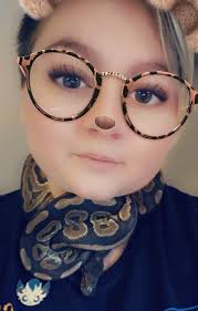 Not a snek but he totally deserves a hat! He's a scaly dog