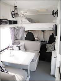 The Finish On The Table And Cabinets Is Perfect An Interlay Black And White Theme Is Really Nice Just Cause It Makes Decorating Life Motorhome Interior Remodeled Campers Rv Living