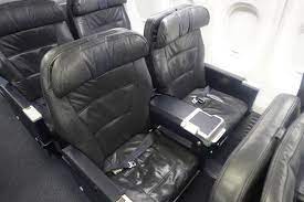 Usually, a power outlet is available on every seat in first and business class, as. United Airlines Boeing 737 First Class Traveling Tee Times