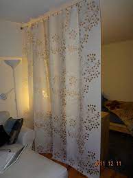 Ikea Panel Curtains Hung On A Wire Curtain Rod Divider Between Bedroom And Living Room In A S Living Room Divider Room Divider Walls Fabric Room Dividers