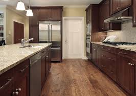 Winslow 3 Panel Shaker Molded Doors From Masonite Walnut Kitchen Cabinets Brown Kitchen Cabinets Wood Floor Kitchen