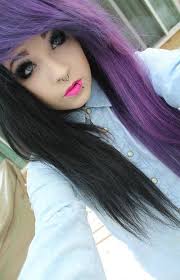 This hair color uses the balayage hair highlighting technique, blending the purple hue throughout your mane for a seamless, dimensional look. Half Ash Purple Half Blk Hair Styles Split Hair Emo Hair