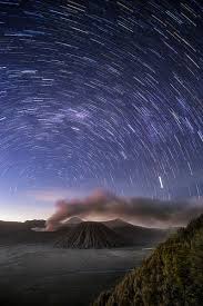 Star Trail Over The Eruption Of Mount Bromo Star Trails Travel Photos Around The Worlds