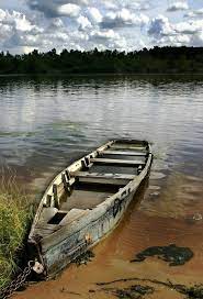 Water Logged Boat Still Tied Up Fotos