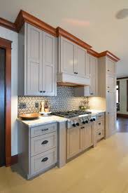 If we're painting kitchen cabinets in a new color, homeowners often ask us whether their crown molding should be painted to match. Pattee Canyon Kitchen Germansen Woodwork And Design