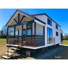 Rrc Homeco On Instagram Cardinal 399 Sq Foot Rv Park Model Tiny House It Has A Back Screened In Porch A Loft With Built In 2020 Tiny House Park Models Cottage