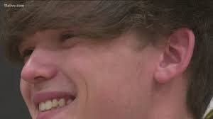 Laurens County student graduates while providing for his family