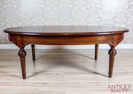 By benjara (1) marcia 47 in. Antique Beauty Oval Oak Coffee Table