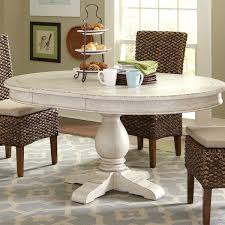 With Its Round Top And Hand Chiseled Grooves This Pedestal Table Creates A Beautiful Setting For Small Dining Table In Kitchen Dining Table Dining Room Table