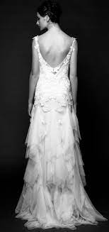 Vines Of Sparkling Embroidered Applique And A Full Handkerchief Skirt Form This Wedding Gown S Tango Worthy Silhouette Roman Wedding Dresses Bridal Wedding Dresses 2014