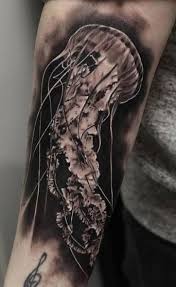 They are created in the shape of dot work, blackwork, tribal and graphic style. Jellyfish Tattoos Meanings Tattoo Designs Ideas