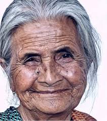 Hidden behind the wrinkles She was old and tired, Sat in her chair. Skin of  soft cotton, And grey ageing hair. The font of all knowledge, Experience to  match, The charm of