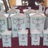 Set of four (4) spun aluminium kitchen canisters. 1