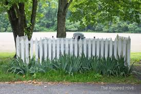 How To Hide A Propane Gas Tank In The Yard In 2020 Propane Tank Cover Propane Tank Art Landscaping Around House