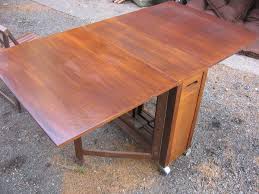 Skinny Drop Leaf Dining Table W 4 Hideaway Wood C Photo Picture Image On Use Com Drop Leaf Dining Table Dining Table Table