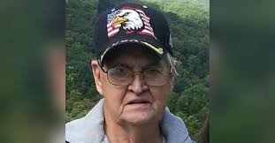 John B. Dollens Obituary