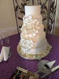 Expanding Rose Wedding Cake With Petals Edged In Gold Wedding Cake Roses Fondant Rose Cake