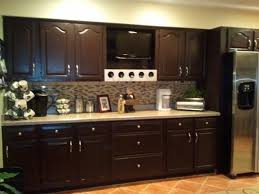 Installing new kitchen cabinets can freshen up your kitchen's appearance and add value to your home. Staining Kitchen Cabinets Darker Ideas Cheap Kitchen Remodel Kitchen Remodel Countertops Kitchen Remodel Cost