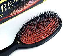 The nylon quills that extend from a tuft of natural bristles detangle tresses, while the boar bristles distribute your hair's natural oils and smooth the cuticle—perfect for creating and maintaining healthy hair. Mason Pearson Boar Bristle Nylon Hairbrush Review The Happy Sloths Beauty Makeup And Skincare Blog With Reviews And Swatches