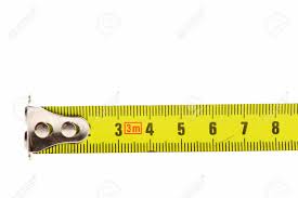 These marks run between the upper and lower scales and are the longest marks on the tape measure, which identifies them as inch marks. End Of Tape Measure In Yellow Color With Black Numbers Isolated Stock Photo Picture And Royalty Free Image Image 79672284