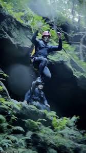 This material may not be published, broadcast, rewritten, or redistributed. Zac Efron Jumps Into A Waterfall While Filming His New Netflix Series In Australia News Parrots