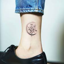 It is a beautiful black and white birth flower that you will love if you are a fan of simple tattoos. 24 Symbolic Lily Tattoo Ideas Lily Tattoo Neck Tattoo Small Lily Tattoo