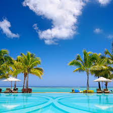 Tropical Beach Resort With Lounge Chairs And Umbrellas Mauritius Tropical Beach Resorts Photo Stock Photos