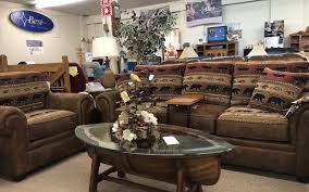An authentic 5' cedar canoe has been converted into a beautiful table with a full glass top and cherry stand. See Something You Like Take It Home Today Cheney S Apple House Furniture