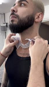 client came from LA for the double cherub neck and throat tattoo.