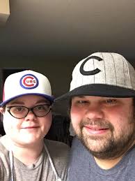 In honor of my boy's first games, a picture of my babys wearing their $21  Cubs jersey and free hat!!