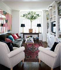 So furniture placement is really tricky, but especially when you have an elongated rectangular room, because this gives you an opportunity more than it gives you the but just remember, in an elongated room you never want to feel like it's just one zone and then the rest of it is this big football field. Tiny Narrow Living Room Rectangle Living Room Small Living Room Decor Small Modern Living Room