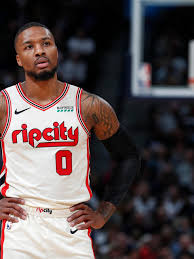 Damian lillard with wife kay' la and son dame jr. Damian Lillard Announces His Family Is Expecting Twins Katu