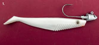 Simply run the hook through the head of the rubber worm, leaving the hook tip on the exterior of the worm. How To Rig Your Soft Plastics