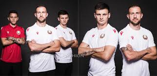 The collar is a polo style, and the backneck is personalised with the logo of the club and the text a jamais nous serons, fiers d. Belarus 2020 21 Macron Home And Away Kits Football Fashion