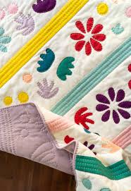Whether you are looking for traditional quilt ideas or free block patterns to utilize some brand new fabric shades, this versatile pattern is going to look great when all is said and done. The Bohemian Garden Quilt Pattern Choose Your Own Adventure Suzy Quilts