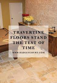 This elegantly designed kitchen uses classic white color scheme from the ceiling wood planks and beams, ceramic tile backsplash and inset style cabinetry blends well with the calacatta marble countertop. Travertine Floors Stand The Test Of Time Pros Cons