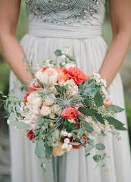 Artificial wedding bouquets that look so real, even though they are fake wedding bouquets. This Coral White And Green Bouquet With Succulents Is A Perfect Addition To Your Spring Wedding Coral Bouquet Wedding Wedding Bouquets Coral Wedding