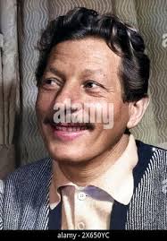 American actor and comedian Danny Kaye pictured with polio sufferers Maureen  Allan and Lorraine Duncan during a visit to Walpole Hall, Edinburgh.14th  May 1965 Stock Photo