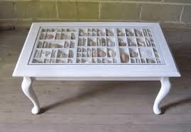 This is pam's beautiful seashell display table.it looks identical to the ikea display table.each section showcases a shell collection from a different trip in a blue painted square tray from michaels.perfect for a sanibel island home! Creative Coffee Table Ideas Design Home Design
